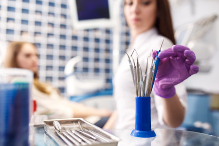 Professional woman dentist doctor working. woman at dental clinic. lady woman at dentist taking care of teeth.の写真素材