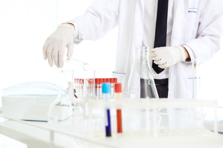 group of scientists working at the laboratory laboratory concept with caucasian male chemist.の写真素材