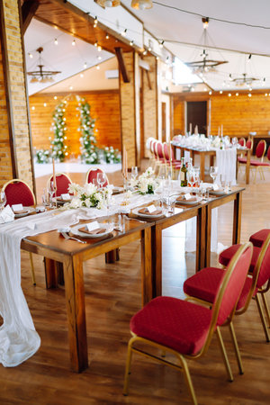 Beautiful table setting for a party, wedding reception or other festive event. Banquet setting,...