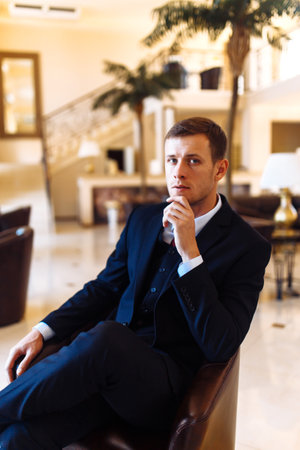 Luxury groom in suit. businessman. The morning of the groom, bridegroom's fees. Sexy man in suit posing.の写真素材