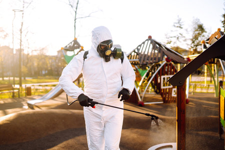Cleaning and Disinfection the playground with spray chemicals to prevent the spread of epidemic.の写真素材