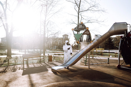 Cleaning and Disinfection the playground with spray chemicals to prevent the spread of epidemic.の写真素材
