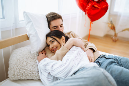 Valentine's day concept. Happy couple in love with. Young loving couple celebrating Valentine's Dayの写真素材