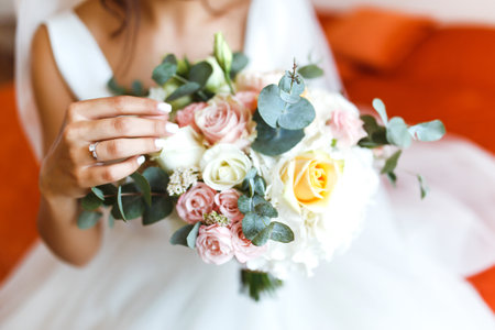 Wedding bouquet in bride's hands. Stylish, elegant bridal bouquet.. Wedding day. Floristy.の写真素材