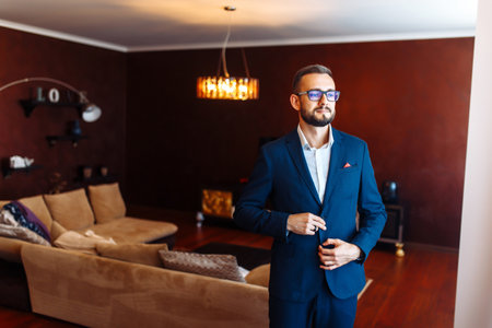Elegant groom in suit. businessman. Portrait of the luxury groom in a jacket. wedding day.の写真素材