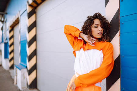 African American woman - dancer dancing in the street at sunset. Sport, dancing and urban culture concept. fashion lifestyle.の写真素材