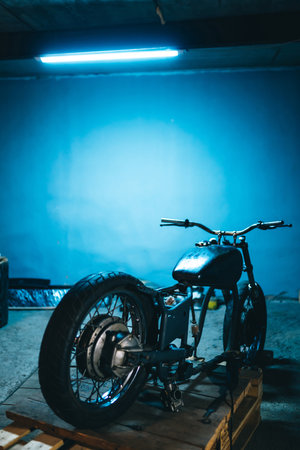 Disassembled motorcycle. Fixing motorcycle standing in repair shop. instruments, equipment. Hobbies.の写真素材