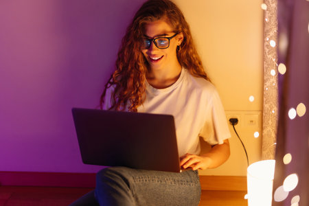 Young woman with laptop. Social networking technology concept. Technology, Freelance, online course.の写真素材