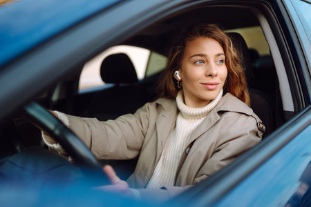 Young woman drive a car. Automobile journey, travel, lifestyle concept. car sharing.