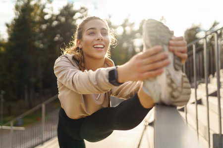 Young woman with smart watch goes in for sports, performs sport exercises. Sport, Active life.の写真素材