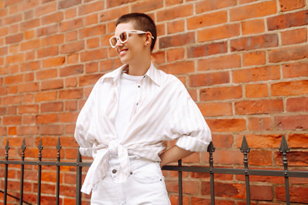 Cheerful tourist enjoys the urban vibe of the streets of Europe.の写真素材