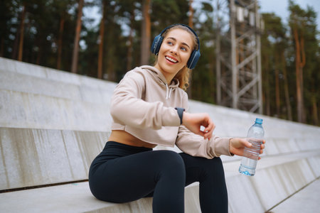 Woman, fitness and stretching in city getting ready for workout. People, sport conceptの写真素材