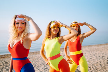 Young dancers in colorful swimsuits are dancing in the morning. ?concept of sports, fitness Active sport.の写真素材