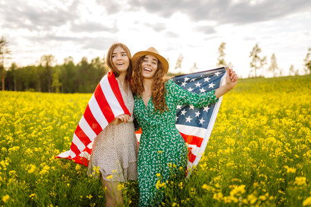 4th of July. Independence Day. Patriotic holiday. USA flag fluttering in the wind.の写真素材