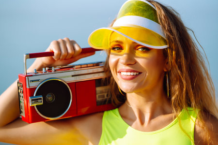 Dancing on the beach. Woman in colorful swimsuits are dancing in the morning. ?concept of fitness,...