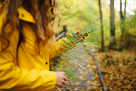 Portrait of young woman walking in the forest. Traveling, lifestyle, adventure.
