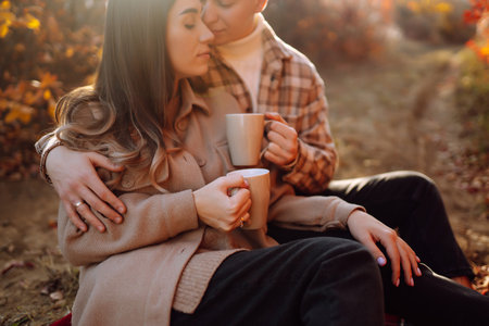 Stylish couple enjoying autumn weather. People, lifestyle, vacations concept. Autumn.の写真素材