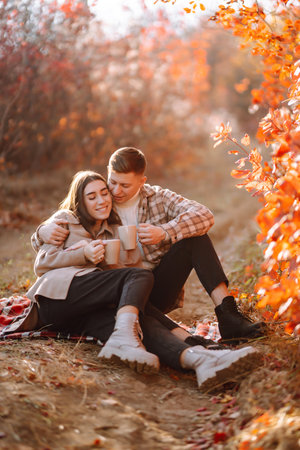 Stylish couple walking and enjoying autumn weather. People, lifestyle, vacations concept. Autumn.の写真素材