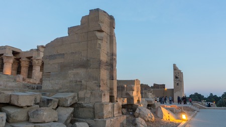 Nice view of Egyptian ancient temple ruins on sunsetの写真素材
