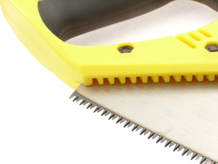 saw with plastic handle on white backgroundの写真素材