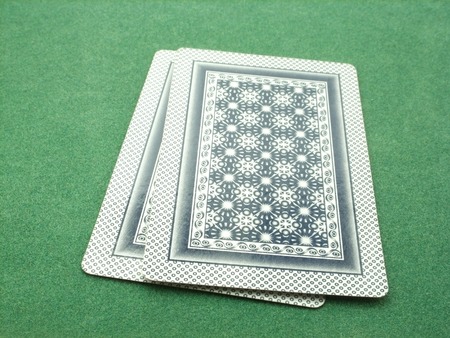 two unknown cards on green velvet tableのeditorial素材