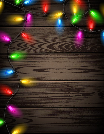 Wooden background with Christmas garland of color lights.のイラスト素材