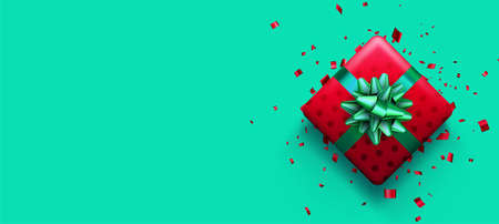 Christmas red polka dot gift box on green background. New Year presents. Space for text. Vector holiday illustration.のイラスト素材