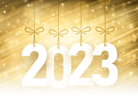 Hanging 2023 sign with bows on yellow brush strokes background.