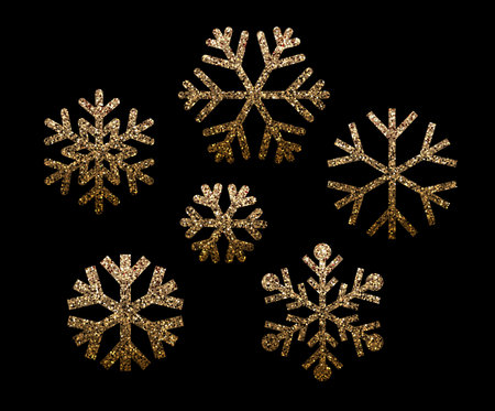 Set of beautiful golden snowflakes with glittering effect. Winter different shapes icons. Vector illustrationのイラスト素材
