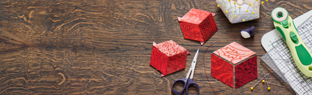 Diamonds stitched in the form of a cube. The process of sewing a quilt.