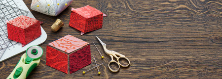 Diamonds stitched in the form of a cube. The process of sewing a quilt.