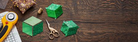 Diamonds stitched in the form of a cube. The process of sewing a quilt.の写真素材