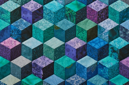 Detail of quilt sewn from rhombuses and has view three-dimensionalの写真素材