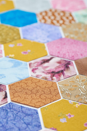 Hexagon pieces of colorful fabric random orderedの写真素材