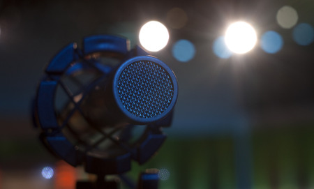 microphone on the stage and empty hall during the rehearsalの写真素材