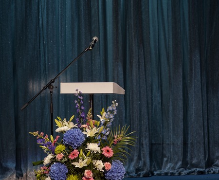 microphone on the stage and empty hall during the rehearsalの写真素材