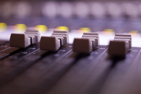 sound studio adjusting record equipment. switching and transmission of soundの写真素材