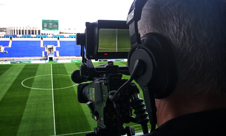 tv camera in the football stadium before the gameの写真素材