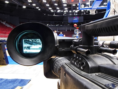 tv camera before the broadcast of the basketball match.