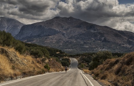 Beautiful view of mountain spiral road and bright blue sky, Crete Greece.の写真素材