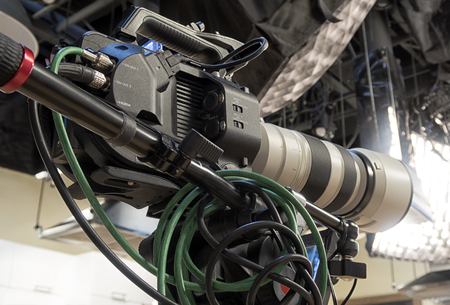 TV Professional studio digital video camera. cameraman