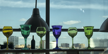 Kitchenware on wooden shelves. Group of stainless steel kitchenware.の写真素材