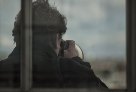Photographer taking picture landmark the european city from a high view point. Travel photos concept.の写真素材