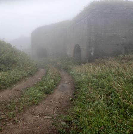 Old abandoned bunker in the woods. Military Fort. Fort number four, Vladivostok, Russia.の写真素材