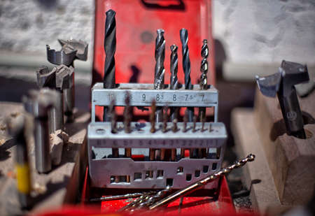 set of working tools on board background