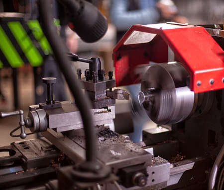 Manufacturing professional lathe machine. Industrial concept. Programmable modern digital lathe.の写真素材