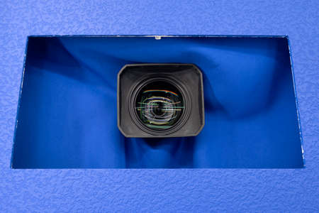 Professional digital video camera lens, studio recording equipment on details close up.
