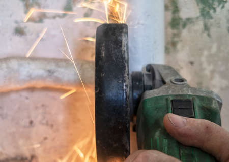 welding metal pipe by acetylene gas burner close up.の写真素材
