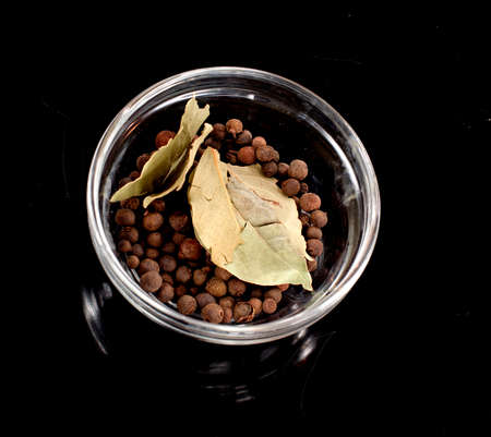 spices in the kitchen close-up on a dark background.