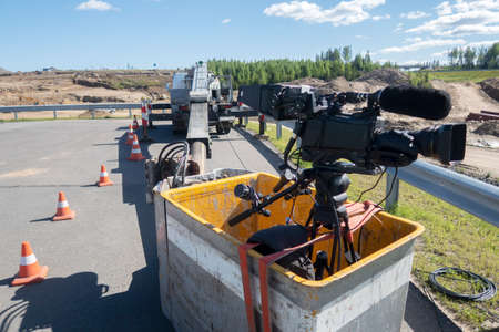 TV camera on the broadcast of motorcycle races. Professional digital video camera. accessories for 4k video cameras.の写真素材
